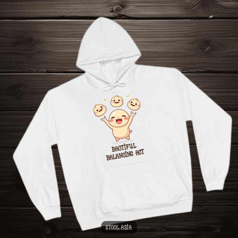 Funny dumpling character joyfully juggling miniature bao buns, printed on a comfortable hoodie for food-themed warmth.