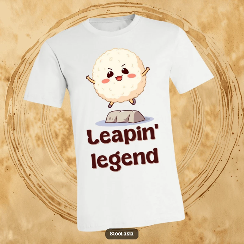 Funny Rice Ball T-Shirt: A playful rice ball with a determined face jumping skillfully over a small hurdle.